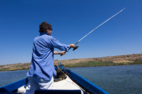 Fishing from a boat on the lagoon